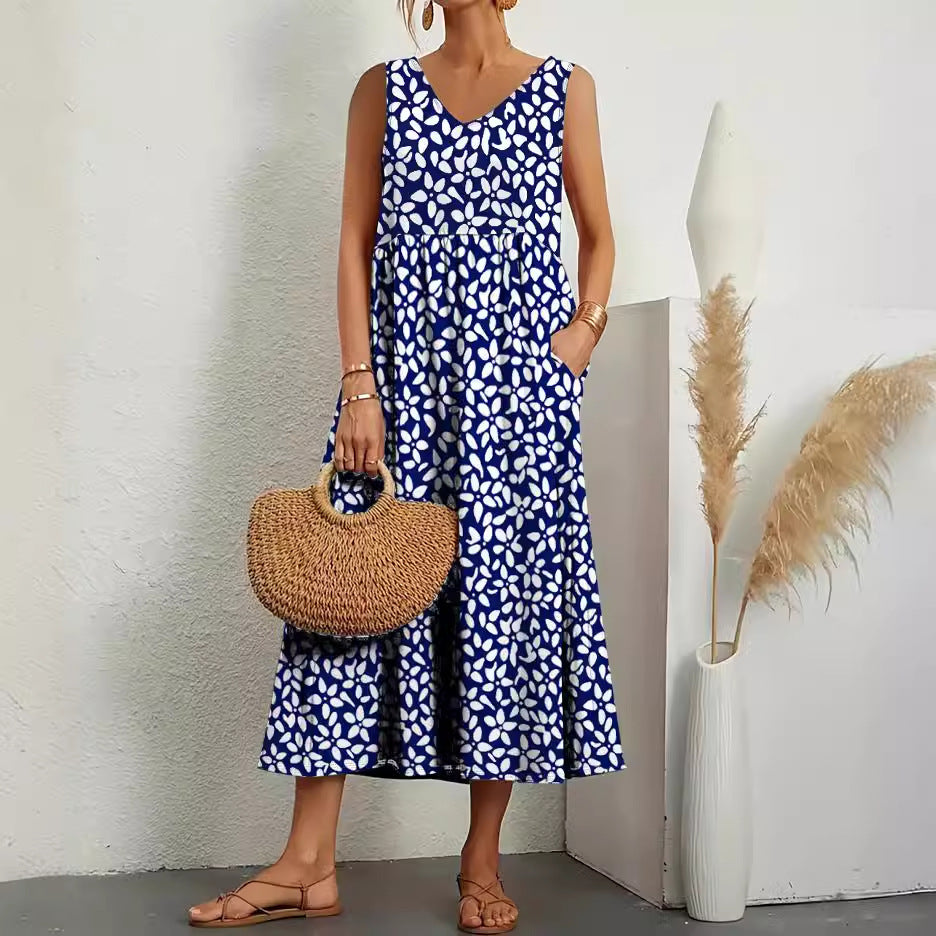 Stilla | Elegant Ærmeløs Lomme V-Hals Print Sommerkjole