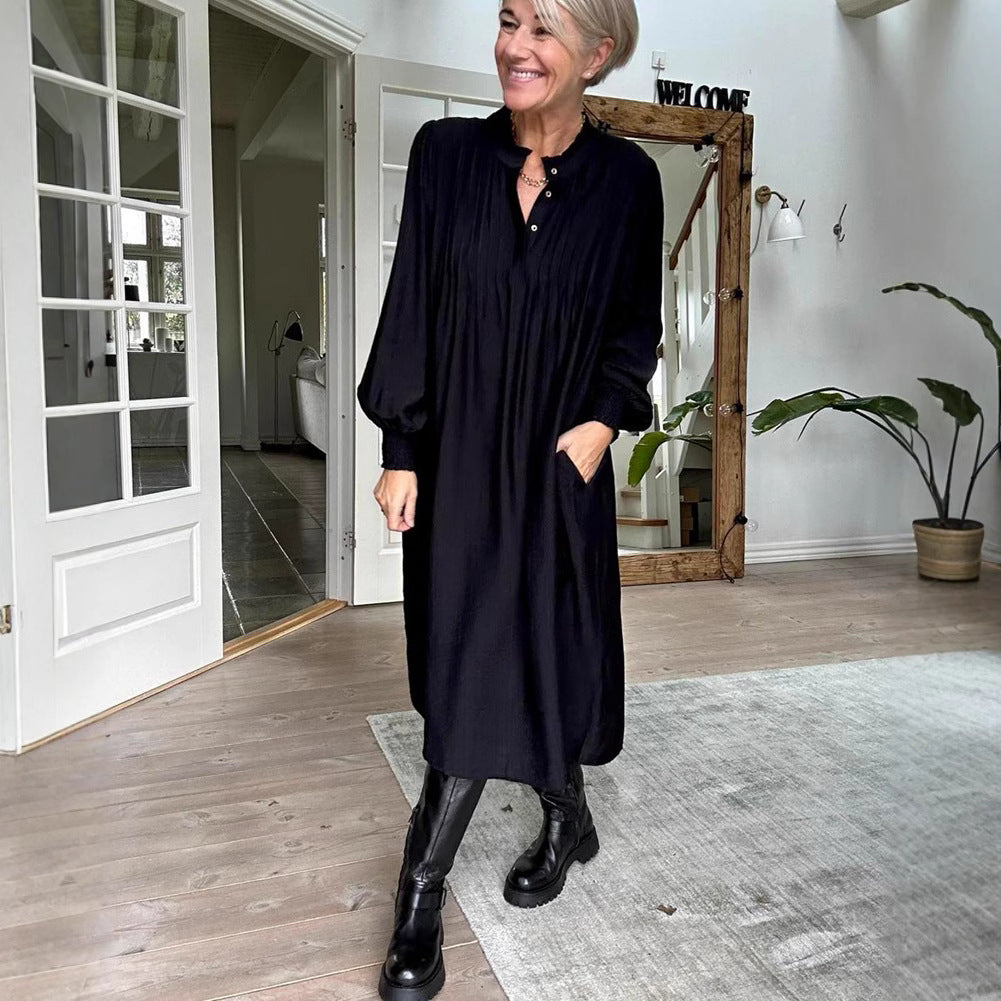 Dame Midikjole med elegant folderstruktur og praktiske lommer Stilla