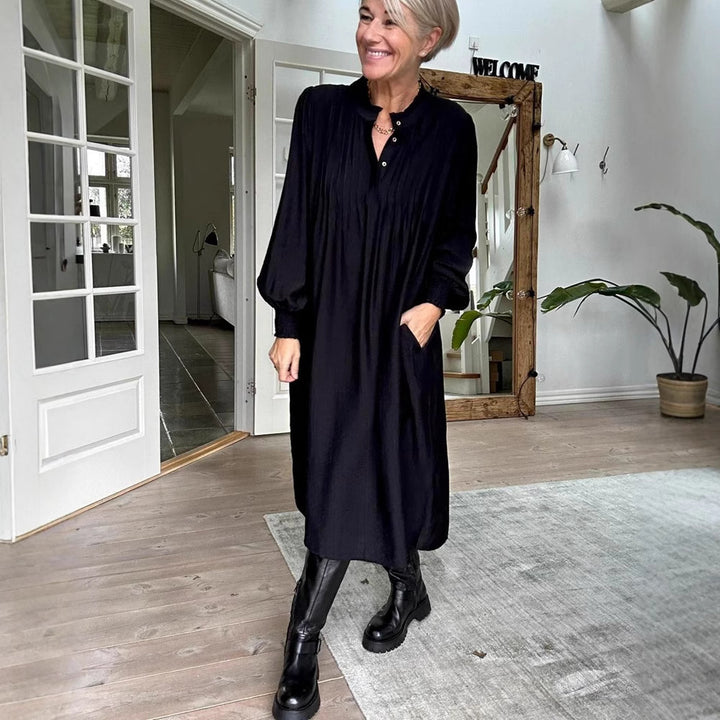 Dame Midikjole med elegant folderstruktur og praktiske lommer Stilla