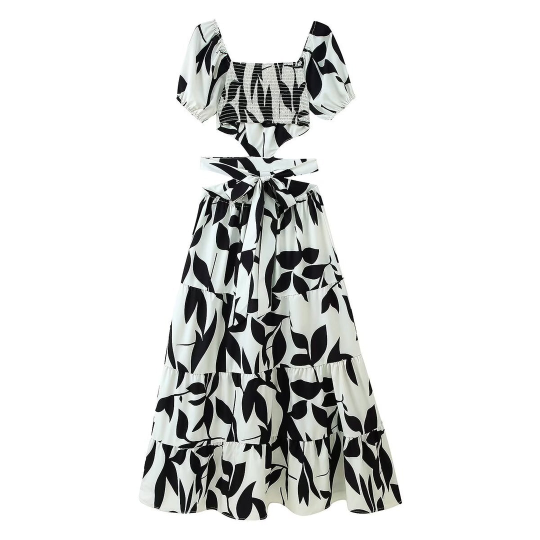 Femme Off-Shoulder Floral Maxi Kjole med lagdelt design Stilla