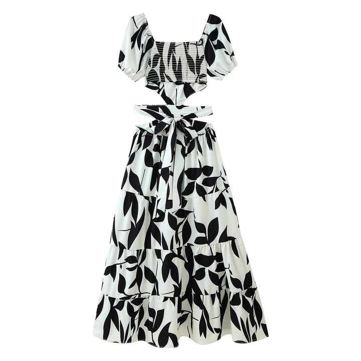 Femme Off-Shoulder Floral Maxi Kjole med lagdelt design Stilla
