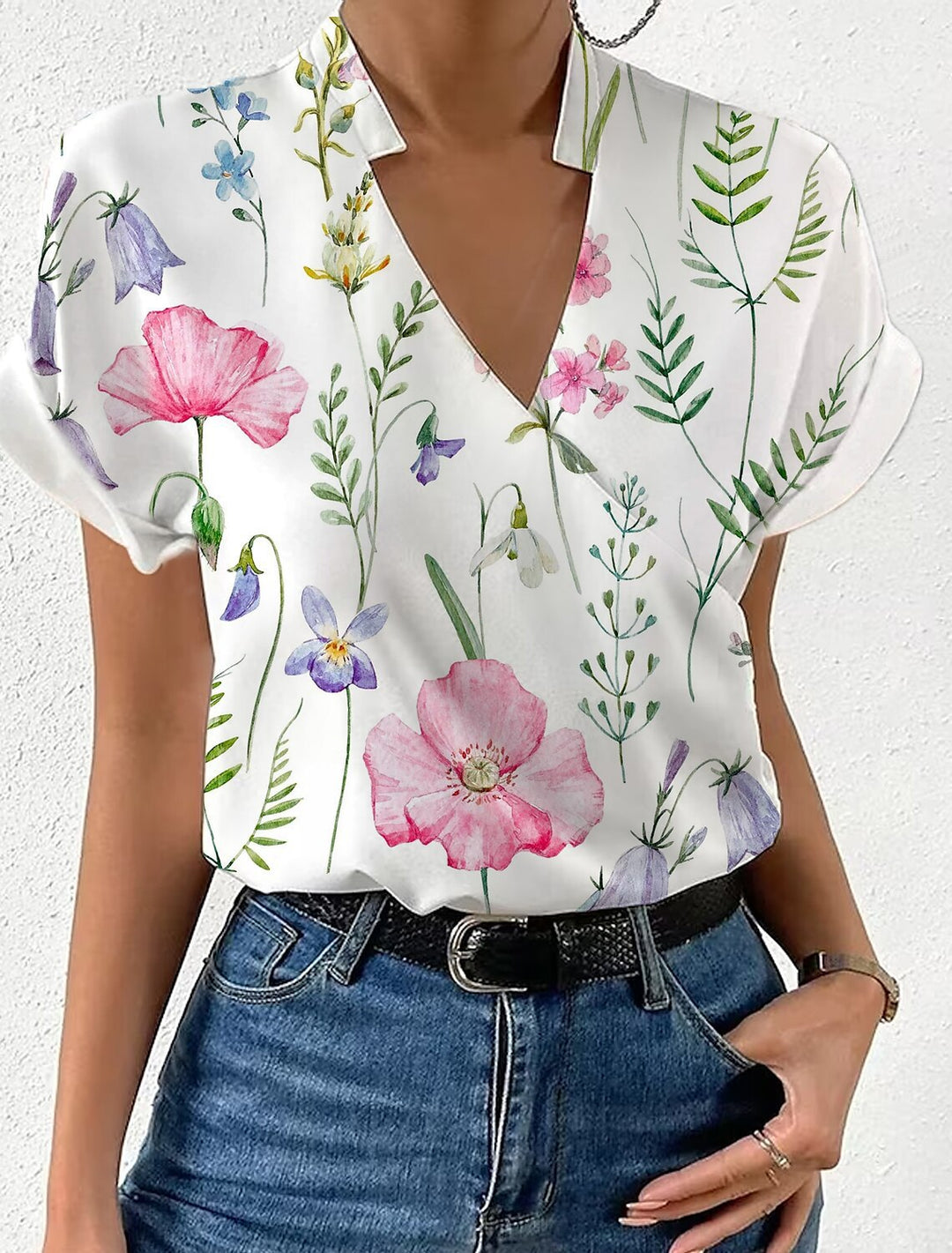 Dame elegant bluse med floralt design og subtil krave Stilla