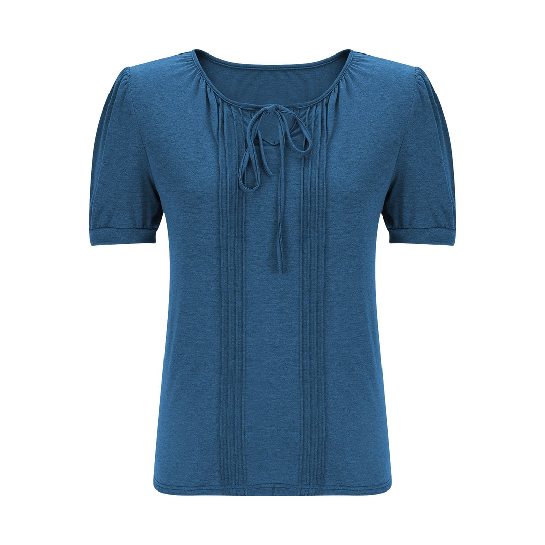 Damebluse med puffærmer og raffineret halterneck Stilla