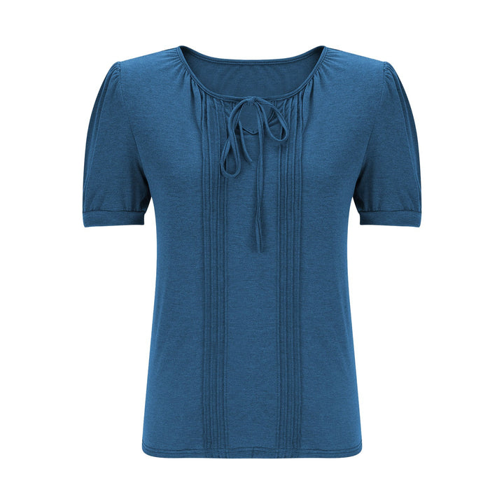 Damebluse med puffærmer og raffineret halterneck Stilla
