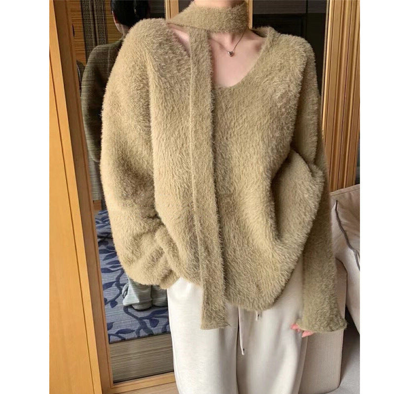 Dame grovstriktr sweater med dyb V-hals og flotte bånd detaljer Stilla