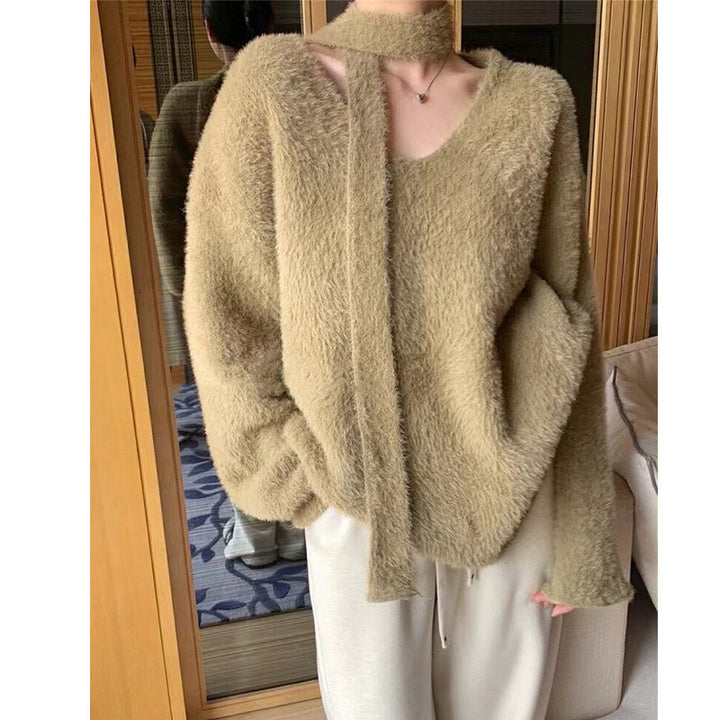 Dame grovstriktr sweater med dyb V-hals og flotte bånd detaljer Stilla