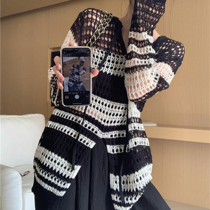 Dame luftig strikket sweater med moderne netdesign og lange ærmer Stilla