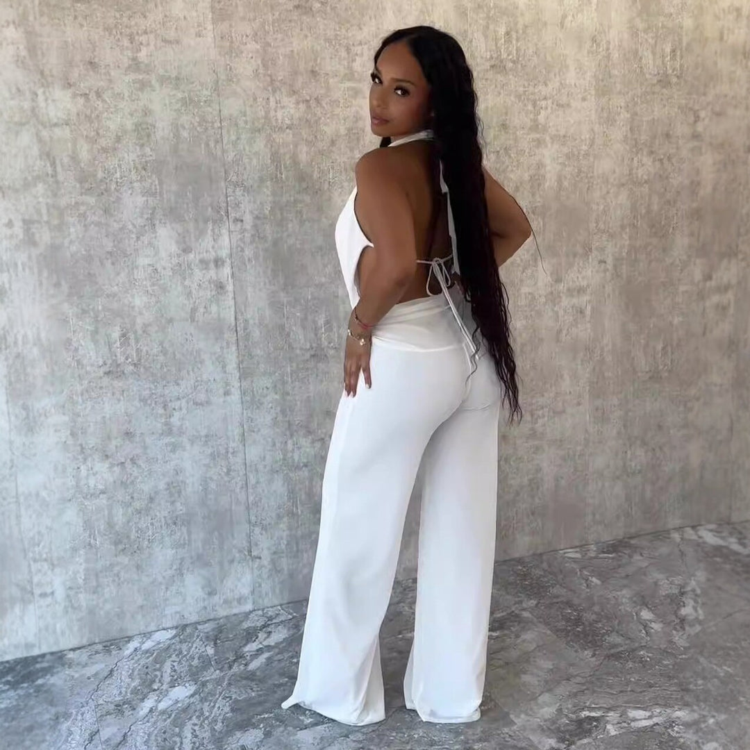 Dame Jumpsuit med elegant indpakningsdetalje og brede benpartier Skovae