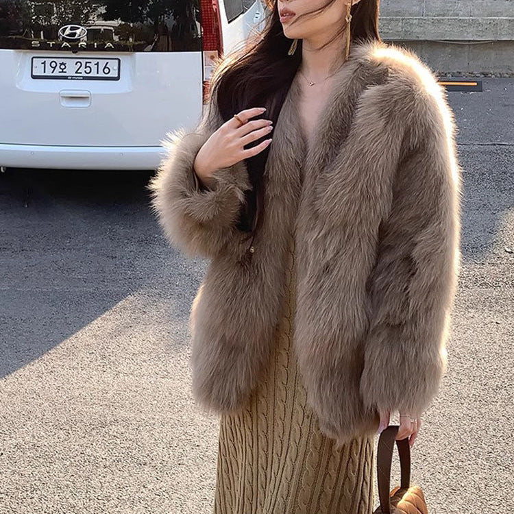Kvindernes fashionable faux fur jakke med elegante knapdetaljer Stilla