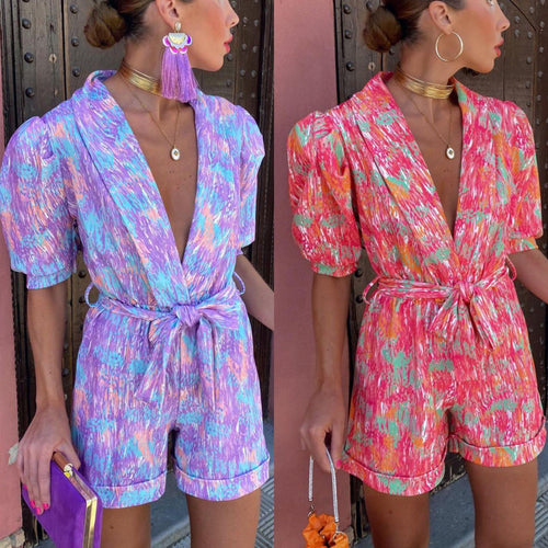 Kvinders Elegante Jumpsuit med Dyb V-Hals og Knapbar Bælte Skovae