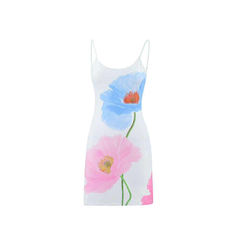 Dame sommerkjole med stilfuldt blomsterprint og elegante spaghetti-stropper Skovae