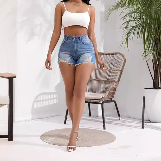 Dame High-Waist Jeans-Shorts med flæset kant og vintage-inspireret vask Stilla