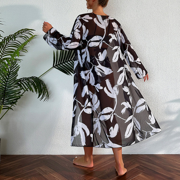 Dame Longcardigan med blomstret mønster og transparent materiale Stilla
