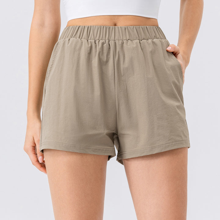 Dame Sporty Kort Shorts med elastisk talje og sidelommer Stilla