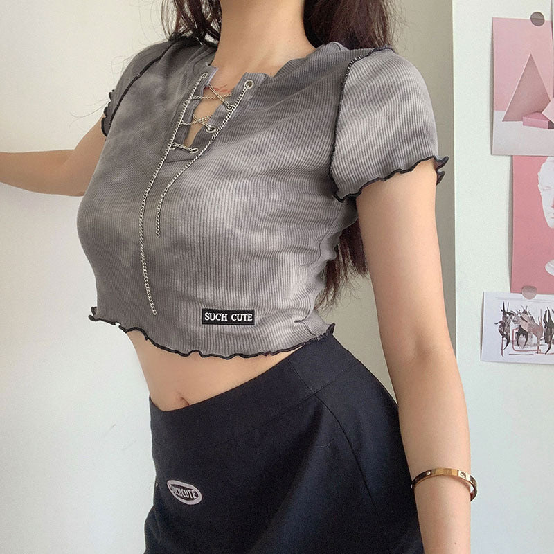 Dame cropped top med moderigtig snøredesign og afslappet kant Skovae