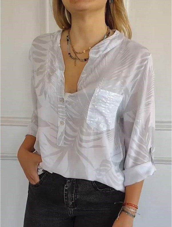 Damebluse med blomsterdesign og glitrende pailletter Stilla