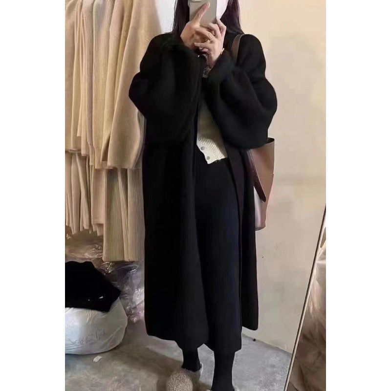 Dame lang strikjakke med oversized pasform og blødt fleecefor