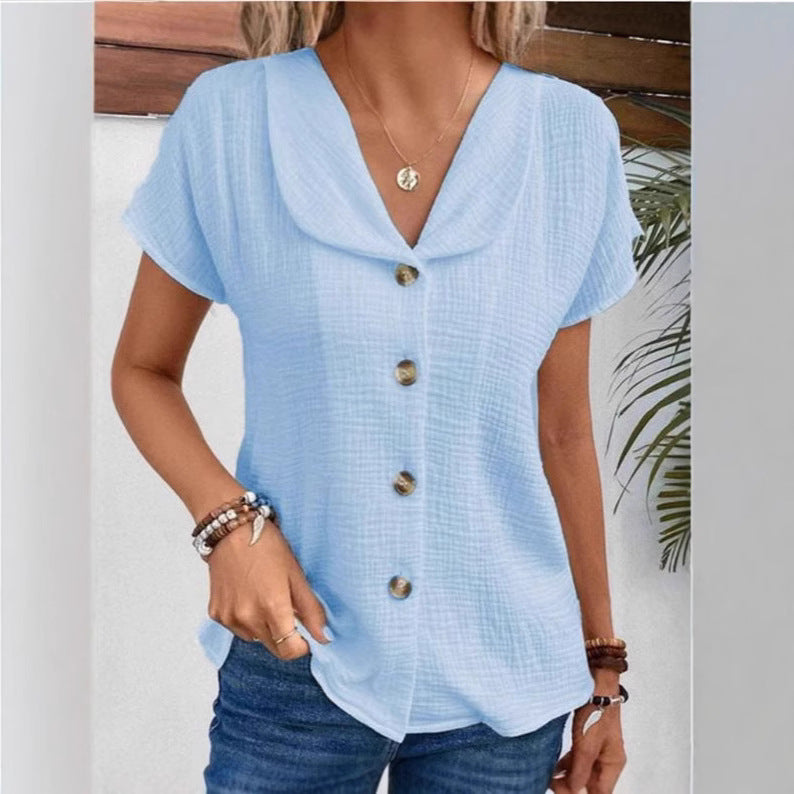 Damebluse med synlige knapper lavet af let stof Stilla
