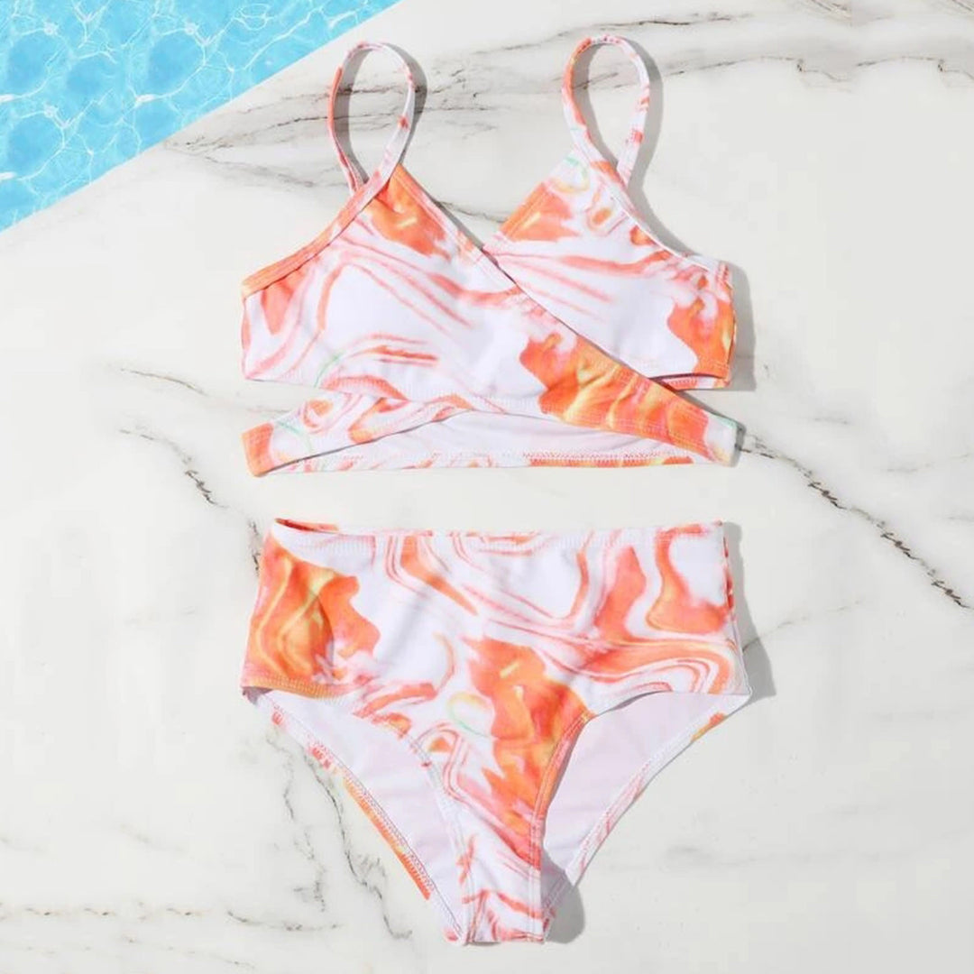 Dame Tankini-sæt med elegant indpakningsoberdel og højskårne shorts Stilla