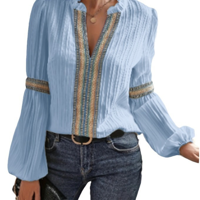 Dame elegant bluse med flæse detaljer og dekorative bånd Stilla