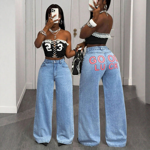 Damernes højtaljede wide-leg jeans med statement print Stilla