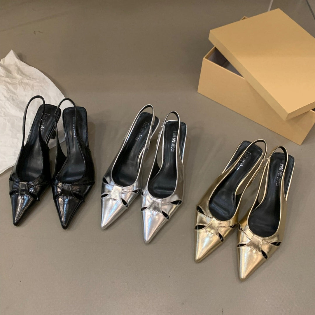 Dame Slingback-pumps med spids tåområde og dekorativt sløjfedesign Stilla