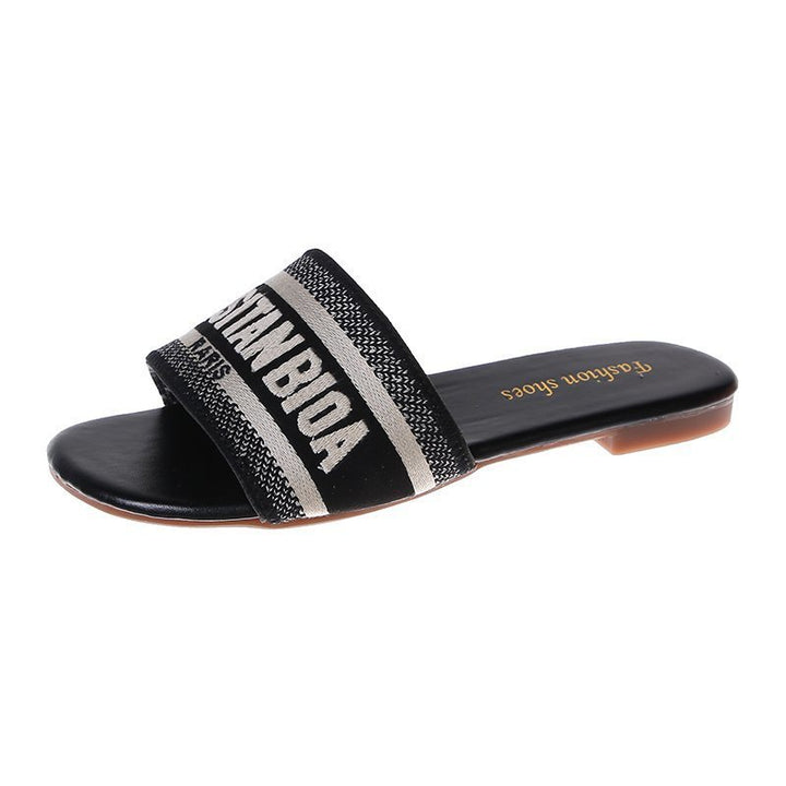Dame Relaxede Slippers med bredt tekstilbånd og moderigtigt tryk Stilla