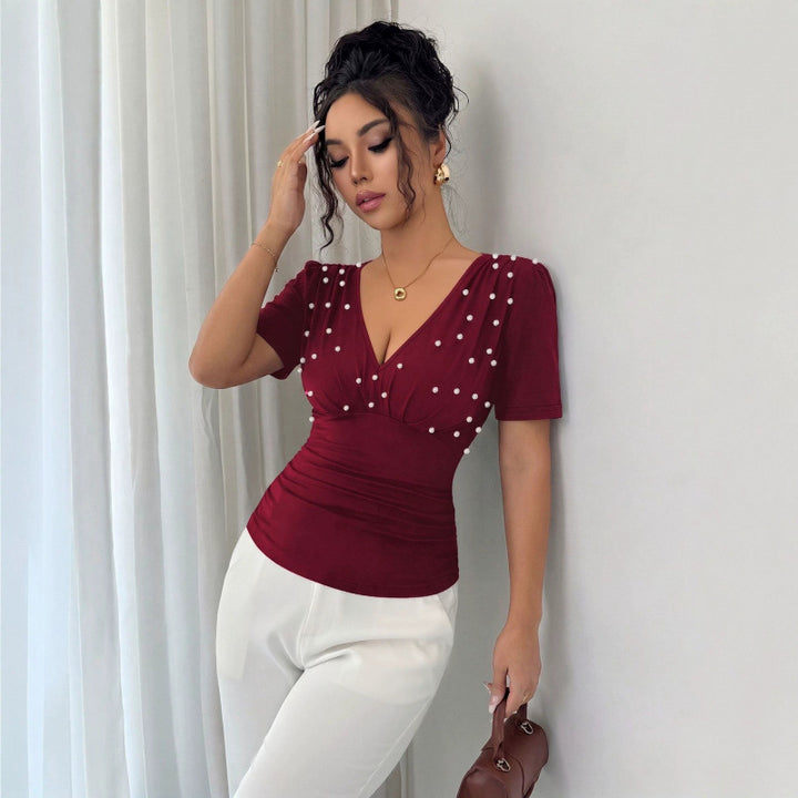 Dame elegant bluse med perle-detalje Skovae