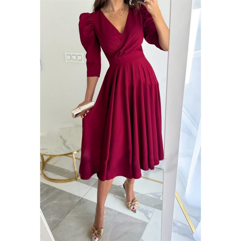 Femme Elegantes Fit-and-Flare Midi Kjole med Pufærmer Stilla