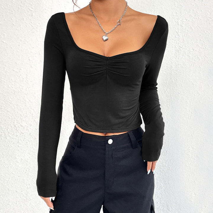 Kvindernes elegante langærmede crop top med stilfuld gathering effekt Stilla