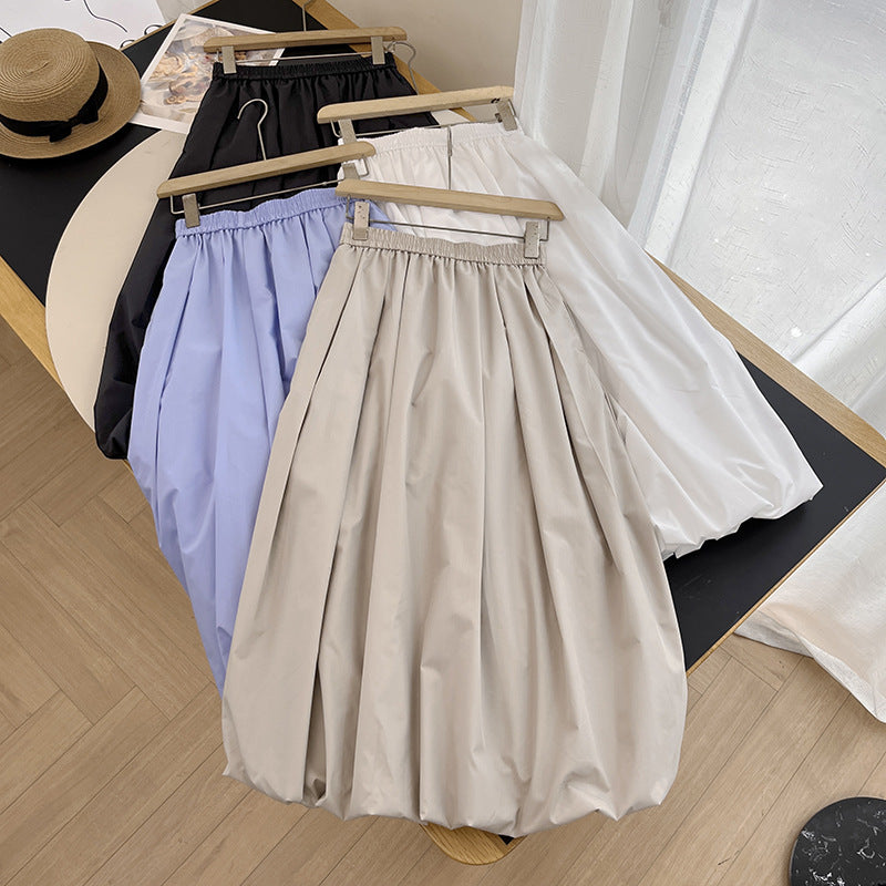 Kvinders elegante midi-nederdel med elastisk talje og voluminøs skæring Stilla