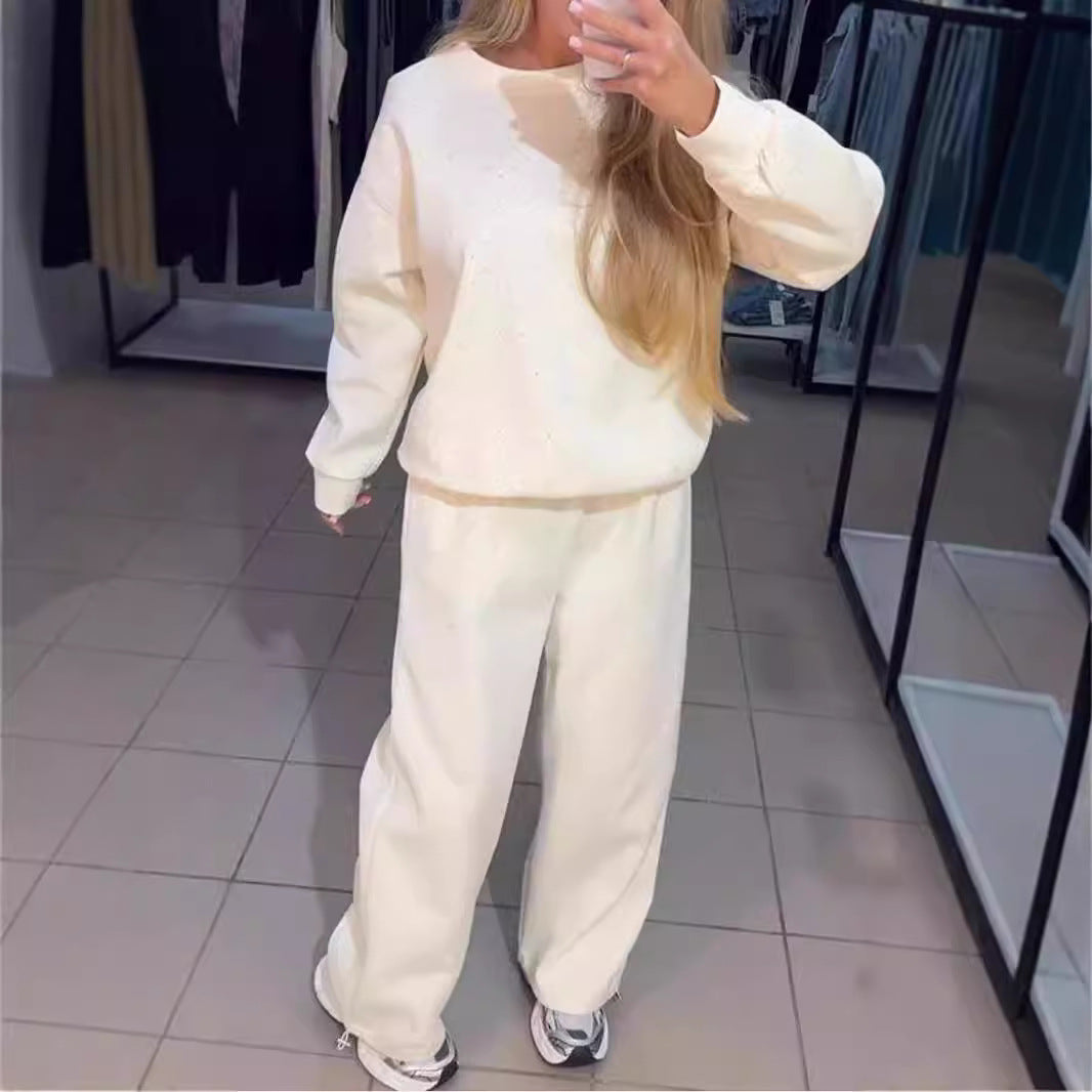 Kvinders sporty lounge sæt med glitrende detaljer og løs pasform Stilla