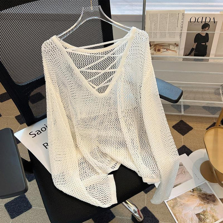 Kvindernes mesh sweater med åben snit og dyb V-hals Stilla