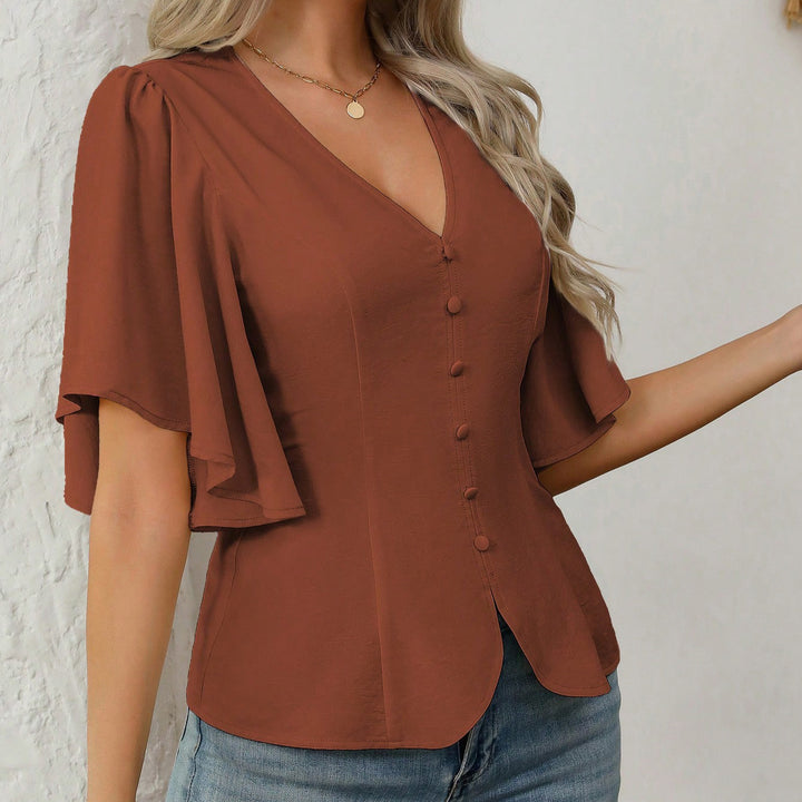 Damer elegant bluse med klokkeærmer og knapdetalje Skovae