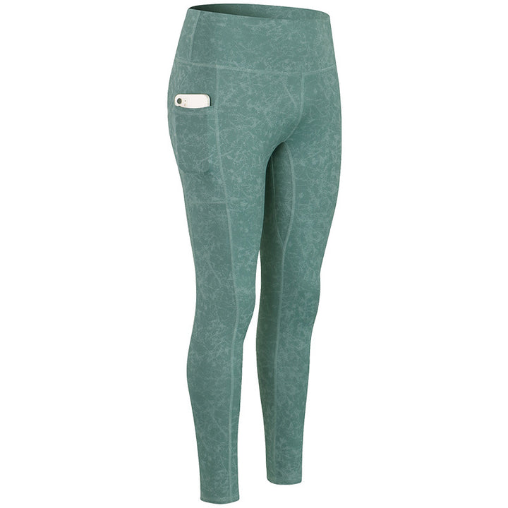 Dame Kvalitets Performance-Leggings med praktiske sidelommer og elastisk talje Stilla