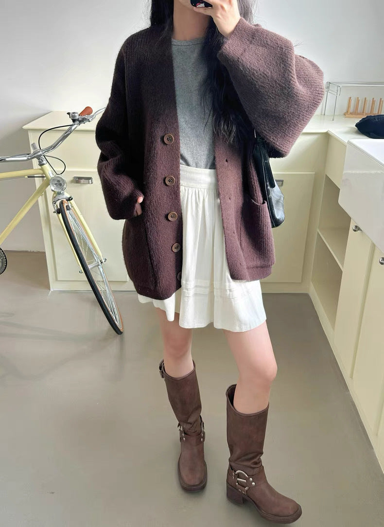 Kvindernes chunky strikket cardigan med elegante knapdetaljer og praktiske lommer Stilla