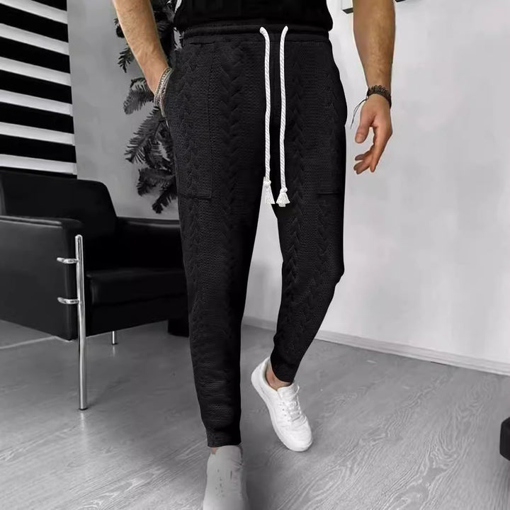 Herre afslappet fritidshose med struktureret design og praktiske lommer Stilla