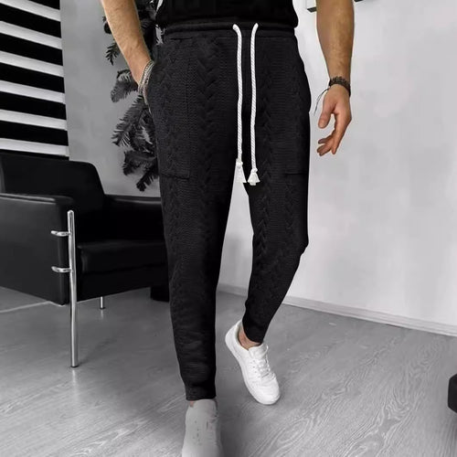 Herre afslappet fritidshose med struktureret design og praktiske lommer Stilla