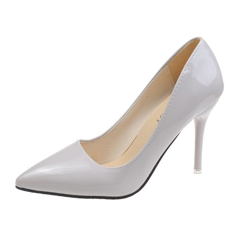 Dame elegante højhælede pumps med spids tåområde og skinnende overflade Stilla