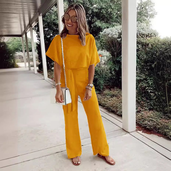 Damer elegant jumpsuit med vide ben og smart bælte Stilla
