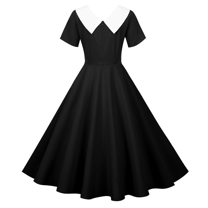 Kvindernes svingkjole med elegant krave og flagrende skirt Stilla