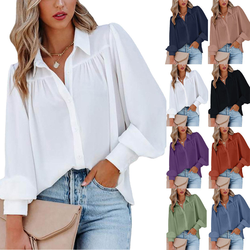 Dame elegant bluse med voluminøse ærmer og knapdetaljer Stilla
