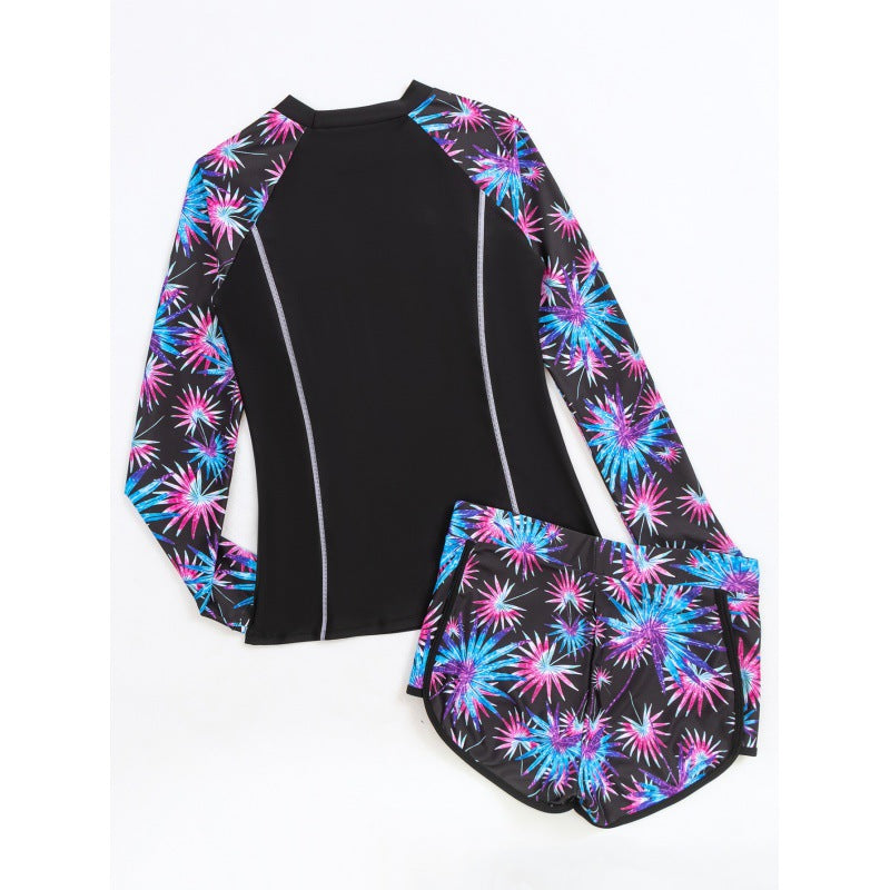 Dame Rashguard med sporty shorts og trendy blomsterdesign Skovae