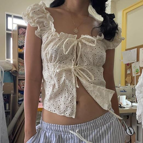 Dame ruffleshirt med lav talje og bindebånd Skovae