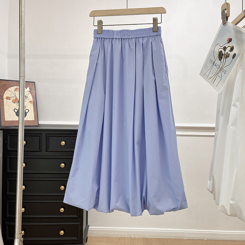 Kvinders elegante midi-nederdel med elastisk talje og voluminøs skæring Stilla