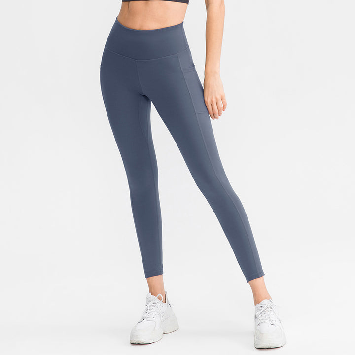 Dame højt skårne fitness leggings med praktiske sidelommer og fleksibelt materiale Stilla