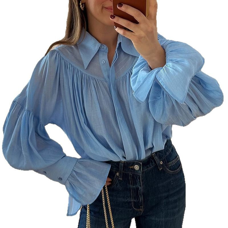 Dame oversized bluse med voluminøse ærmer og elegant knaplukning Stilla