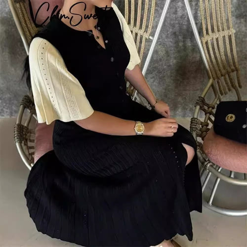 Dame langærmet kjole med elegant ribstruktur og knapper Stilla