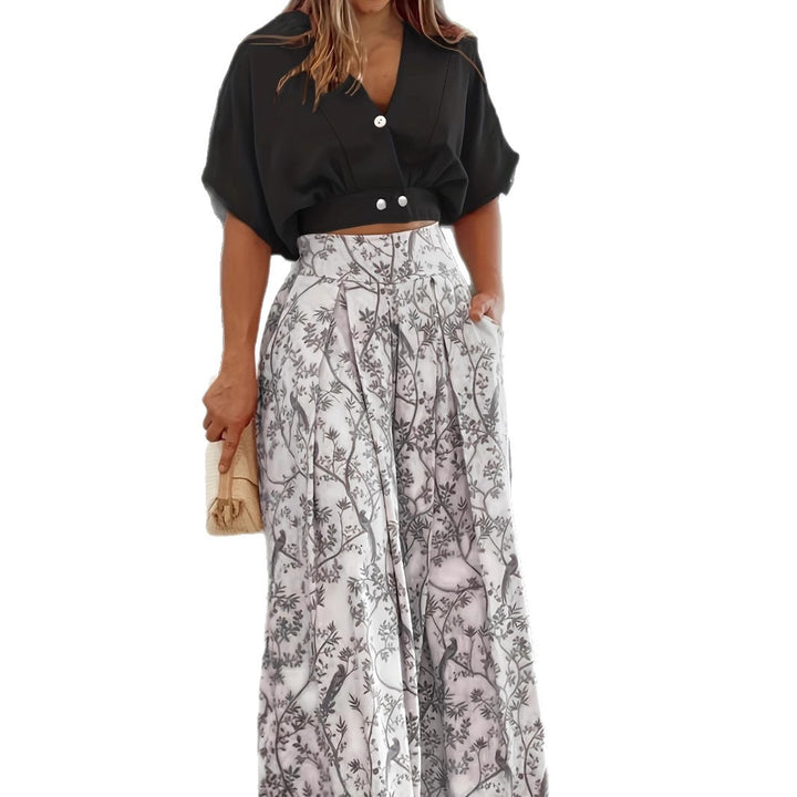 Dame elegant crop-top med knapdetaljer og maxiskirt med blomsterprint Stilla