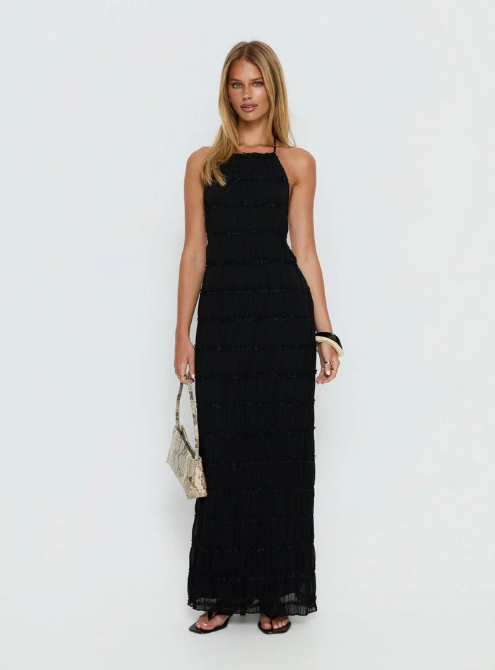 Dame maxikjole med off-the-shoulder design og flydende flæser Skovae